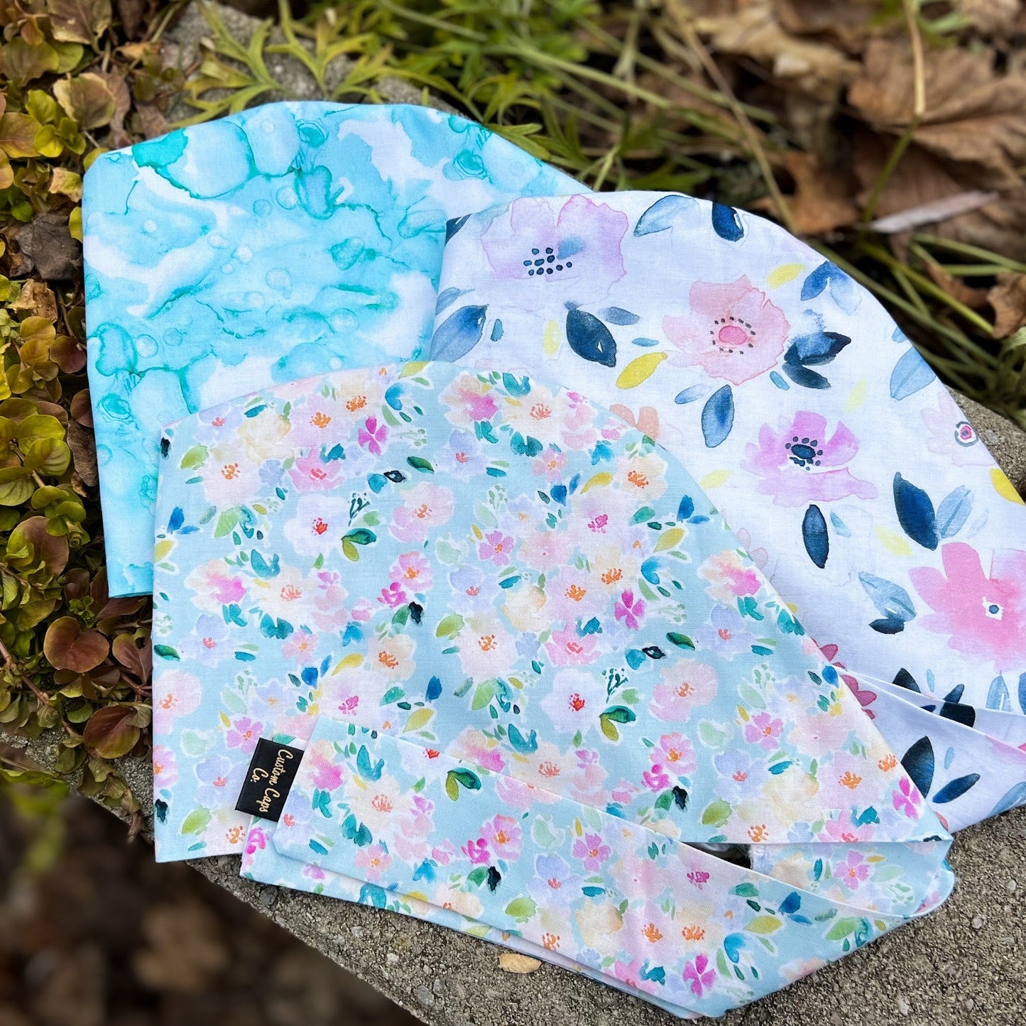 Watercolour Flowers on Blue | Pixie - Custom Caps Co. 